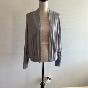Prana Foundation Shrug medium grey in color.  New condition.  Yoga/ Pilates